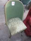 Wicker framed upholstered chair