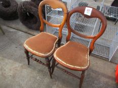 Two dark wood framed upholstered chairs