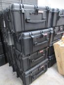 Four Tsunami hard plastic transport cases, with 7 locks, approximately 30" x 20" x 16". Located at