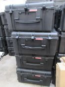 Four Tsunami hard plastic transport cases, with 7 locks, approximately 30" x 20" x 16". Located at