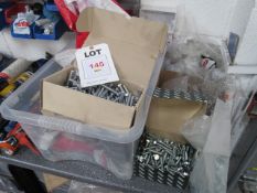 Assorted nuts and bolts and wall-mounted tote bins and wall hanger. Located at Unit 1, Neptune