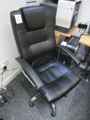 High backed leatherette upholstered office chair with chrome base / feet . Located at Unit 1,