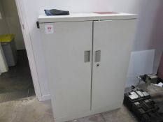 Two door steel cabinet with contents to include assorted cleaning consumables. Located at Unit 1,