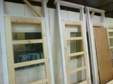 3 sets of primed timber door frames 265cm x 98.5 cm complete with softwood doors (no glazing), spare