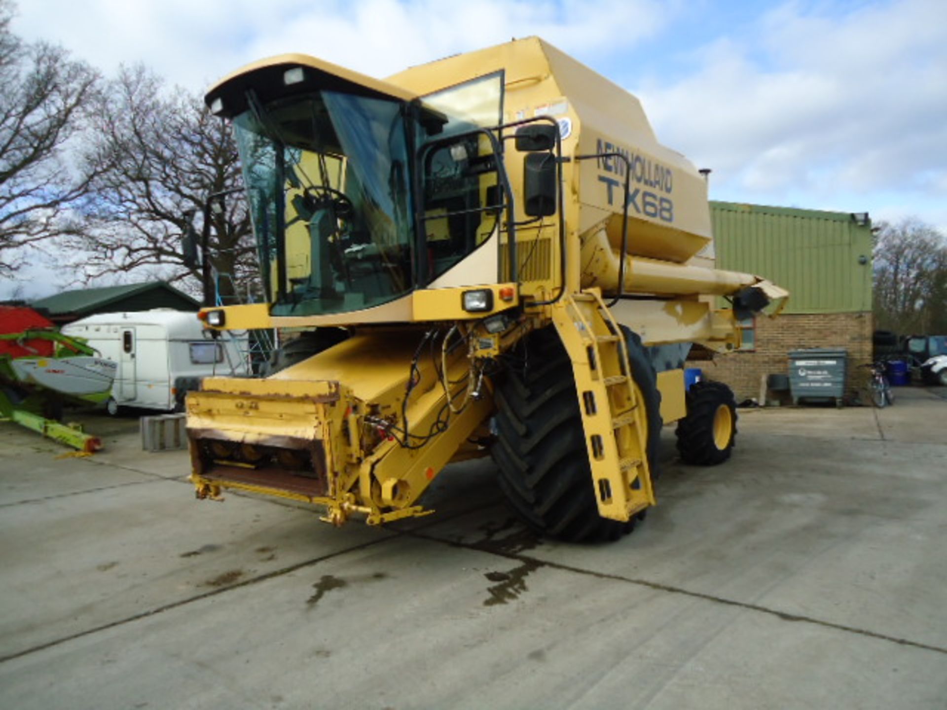 New Holland TX68 combine harvester with 24ft header and trailer, Registration No. N/A, Year of