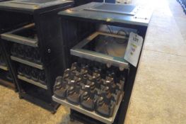 Lot comprising 24 Motorola MC70/75 type charging bases throughout and 5 mobile storage cabinets,