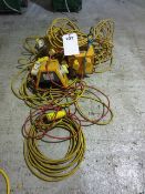 Three assorted splitters and three 110v extension leads