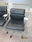 Two Charles Eames Vitra chrome framed 5 spoke mobile leather elbow chairs