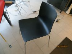 Four  Arper Catifa 46 chrome and plastic stools with black melamine table