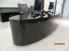 Black melamine lozenge shaped reception desk 3m 20cm x 1m 10cm c/w 2 Liberty humanscale swiveland