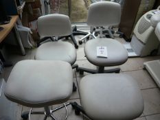 Two light adjustable stools and two height adjustable chairs