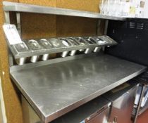 Wall mounted stainless steel preparation counter, with 11 bin ingredient shelf and additional shelf,
