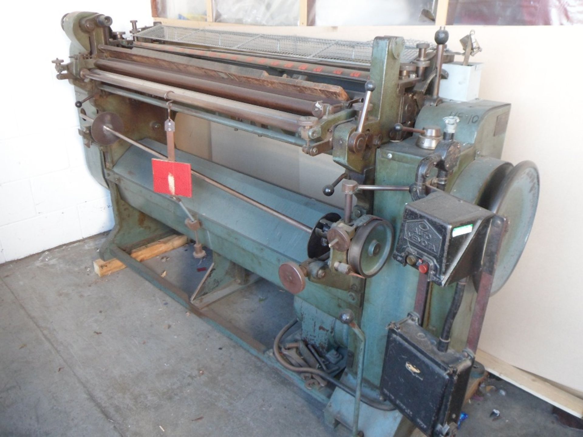 TH Dixon model 412-54 54in wide cloth slitter/cutter, serial no. 72, 440v (located at Falkirk).