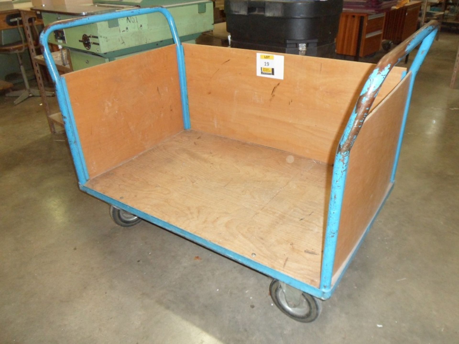 4 wheel tubular steel framed trolley, 48in x 30in with plyboarding to 3 sides (located at Falkirk)