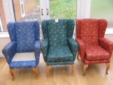 Three Wingback chairs blue, green and red