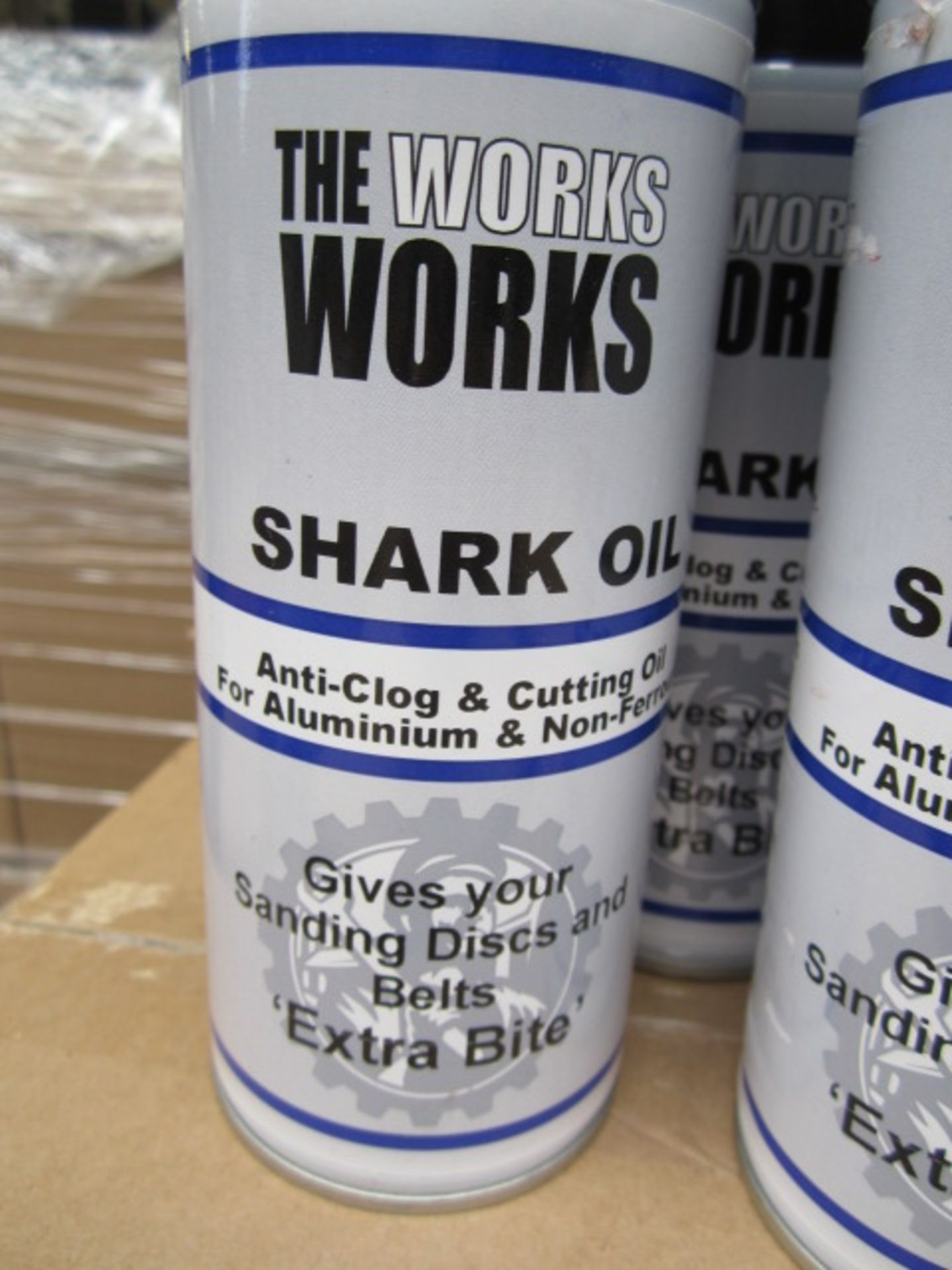 Fourteen boxes The Works Shark oil, 12 x 300ml aerosols per box. 129 cans