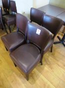 Four brown leather effect dining chairs, brown timber frame