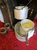 Ten assorted cooking pots and two frying baskets