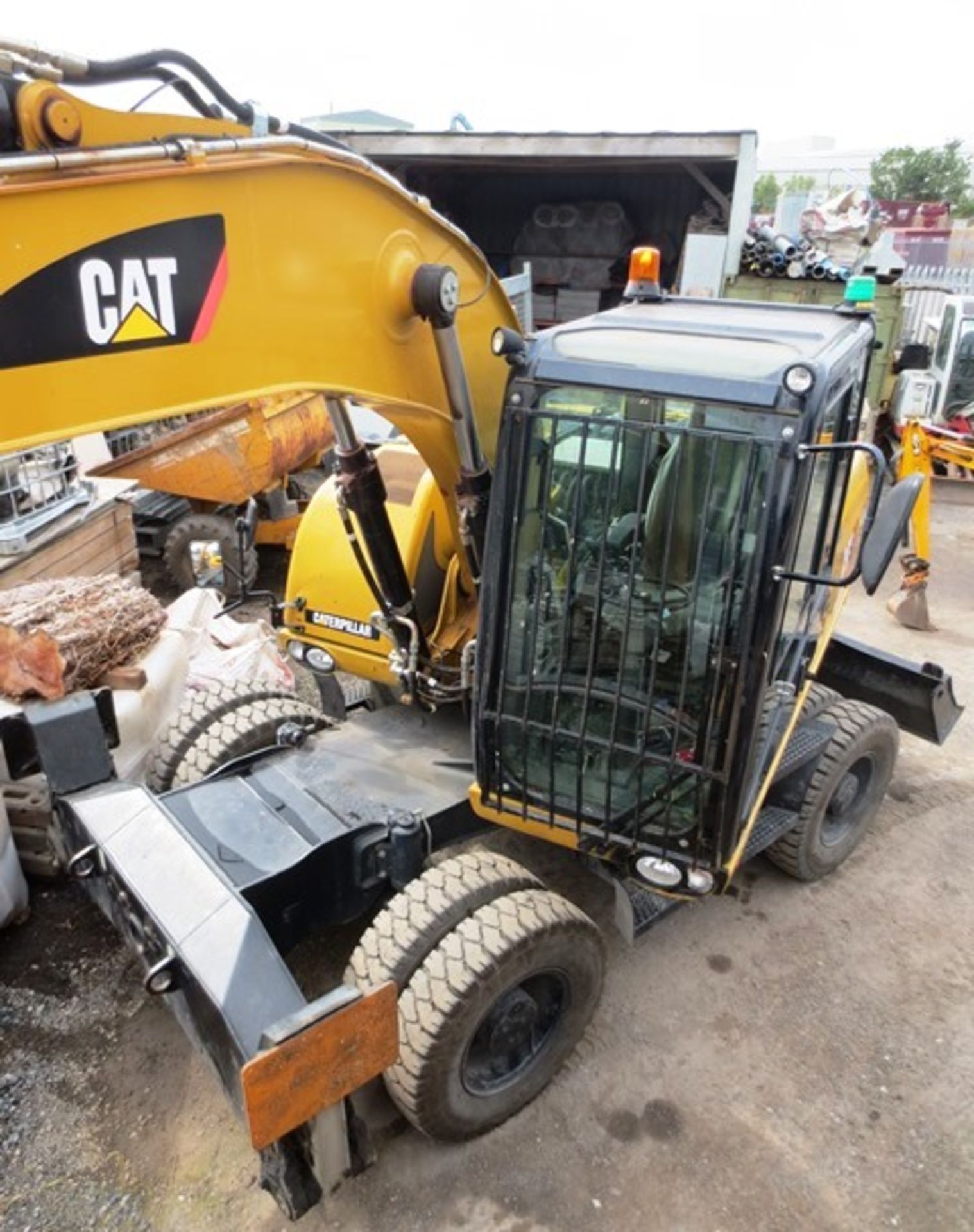Caterpillar M313D wheeled hydraulic excavator with rear dozer and hydraulic supports, product ID No: - Image 5 of 21