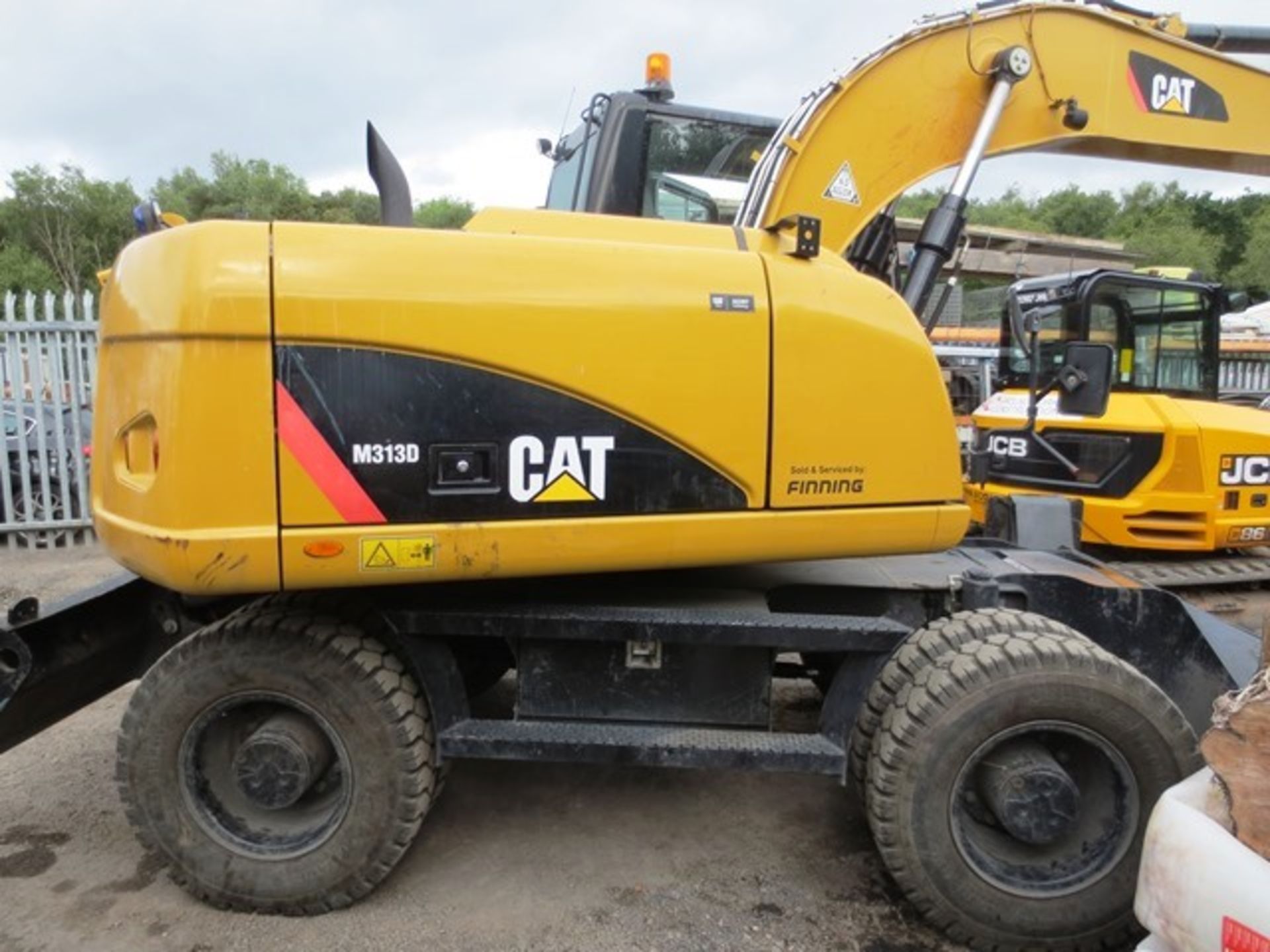 Caterpillar M313D wheeled hydraulic excavator with rear dozer and hydraulic supports, product ID No: - Image 10 of 21