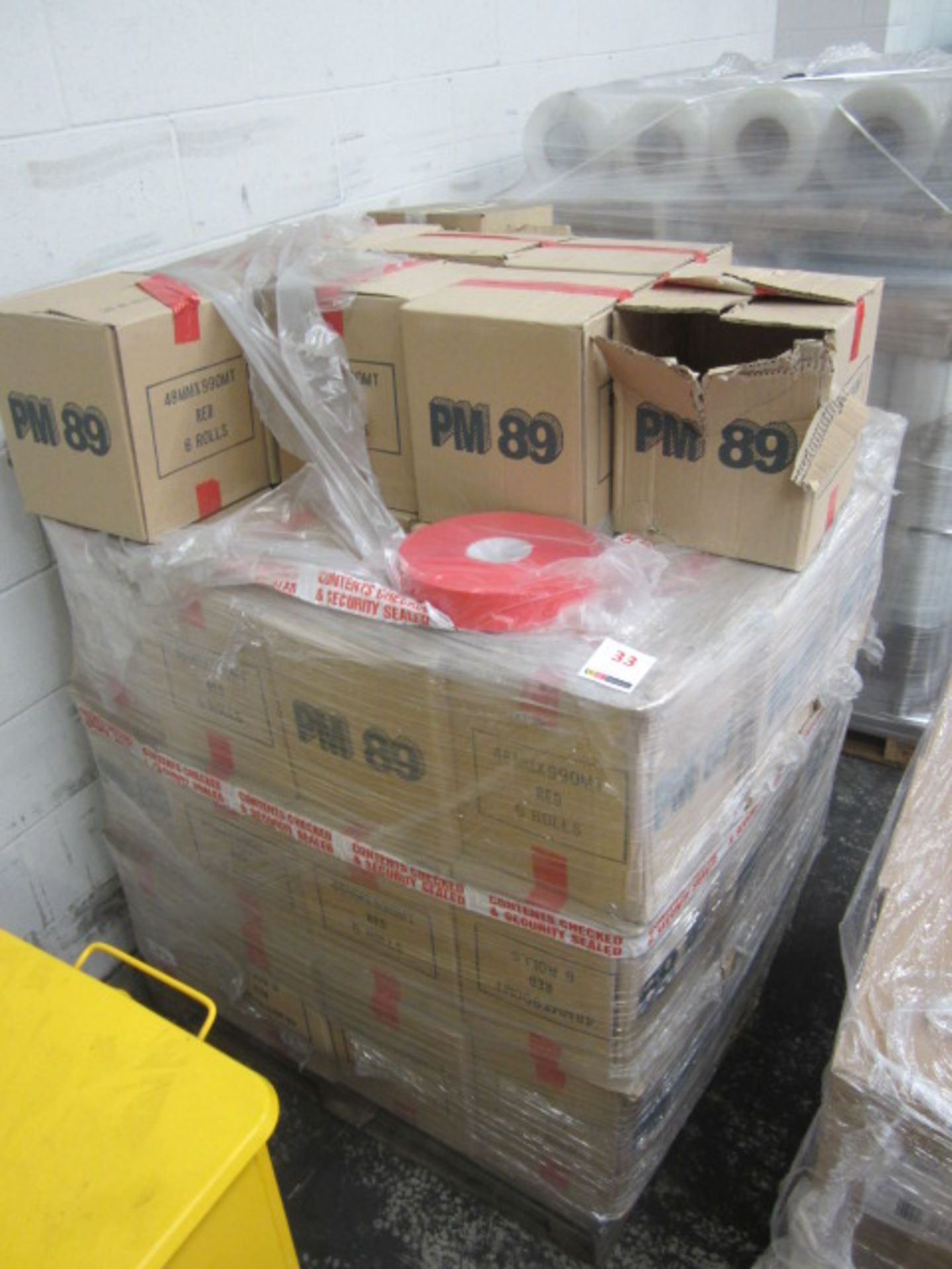 Approximately 43 boxes PM89 red tape, 48mm x 990m, 6 rolls per box Located: Kingsditch Lane,
