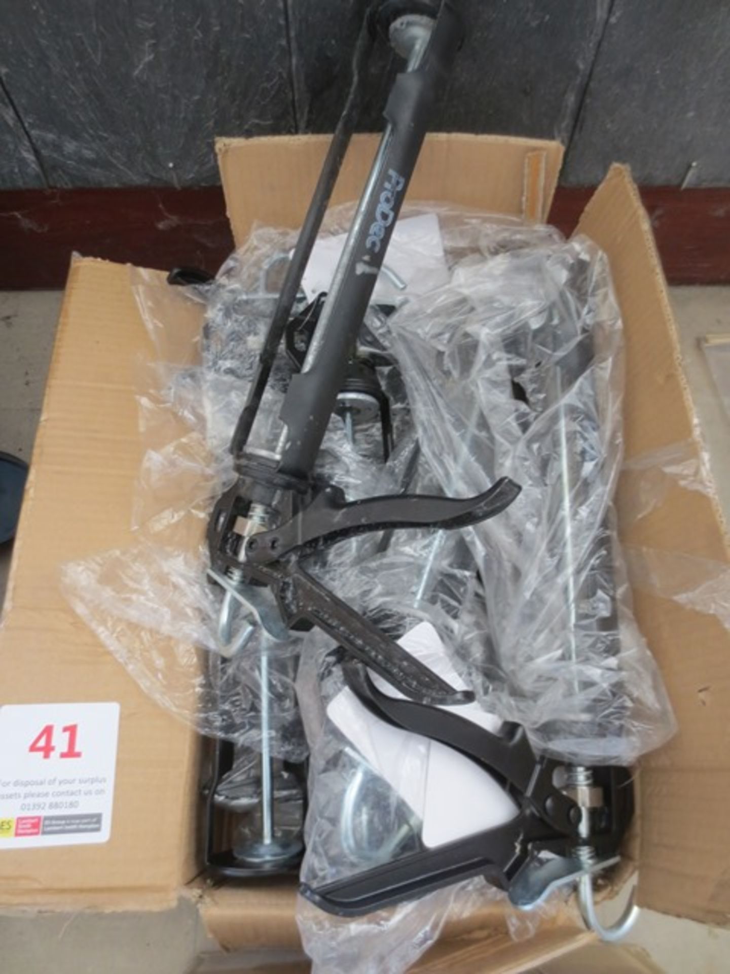 Box of sealant guns