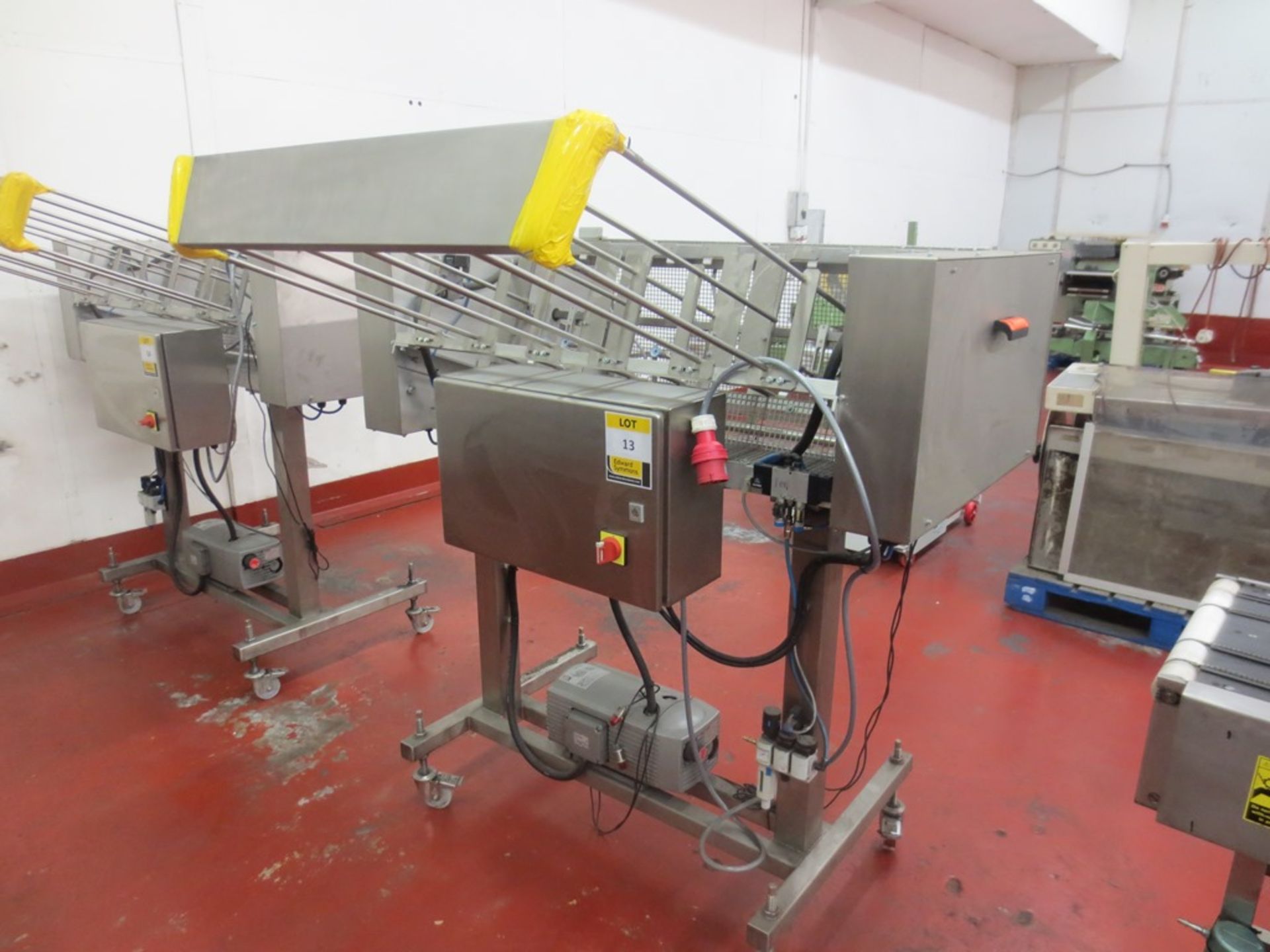 All stainless steel multi cavity mobile  tray denester fitted with Becker Vacuum pump, 3 position