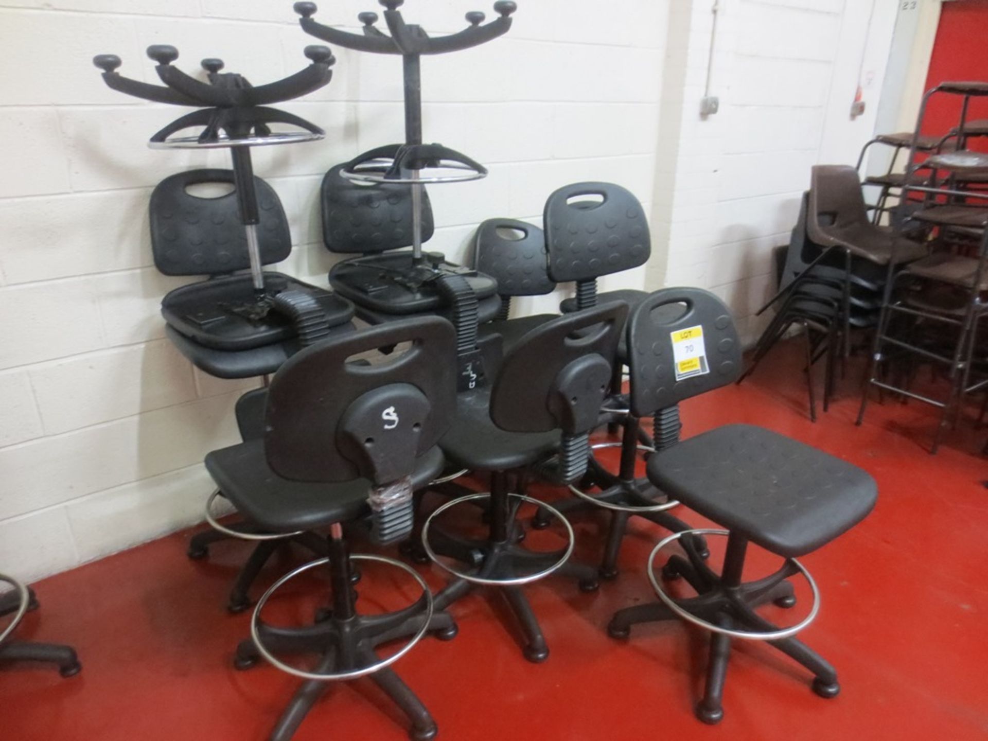 10 swiveling  rubber operators chairs with foot rest