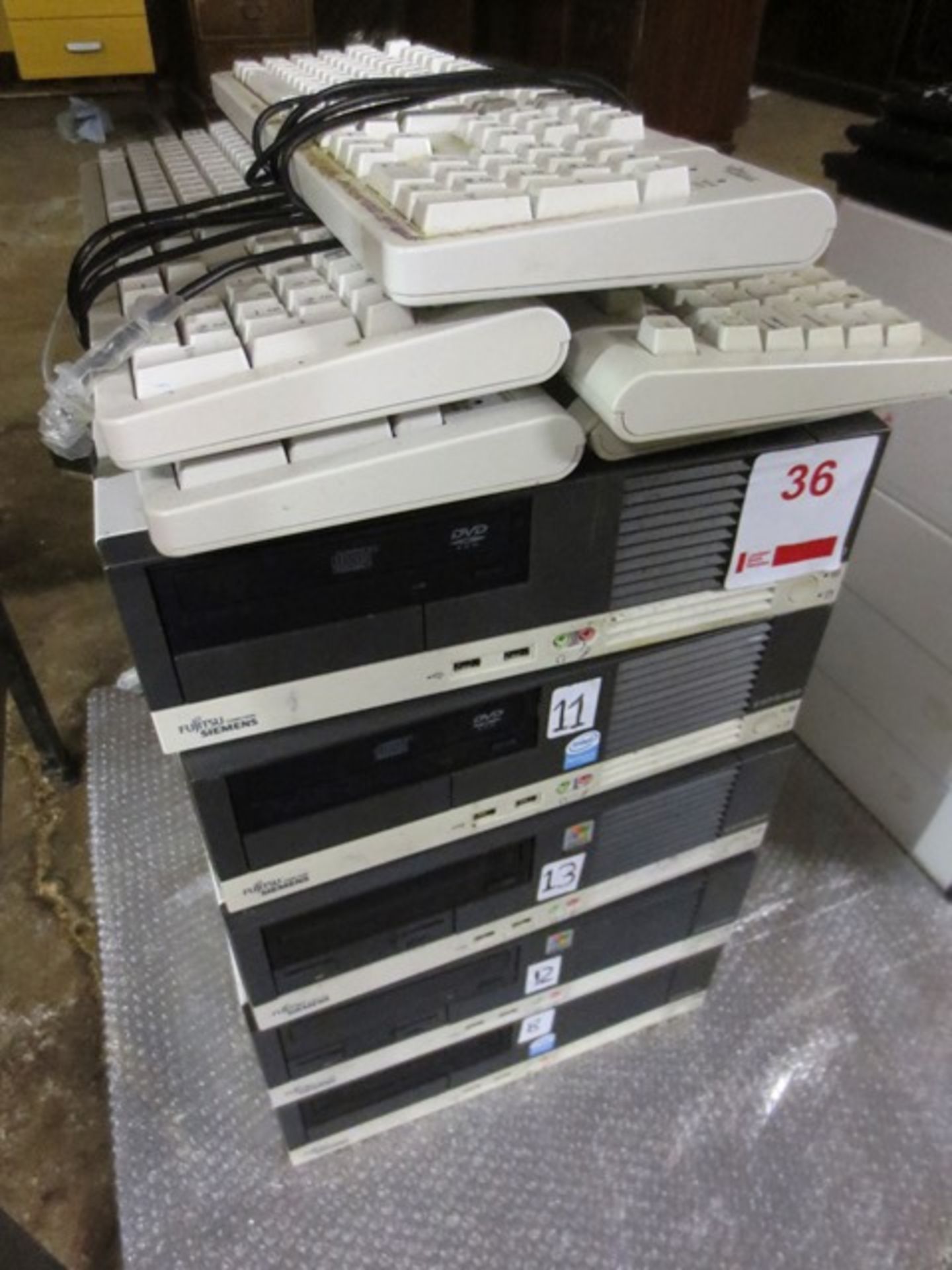 Five Fujitsu Siemens Esprimo desktop PC units and keyboards