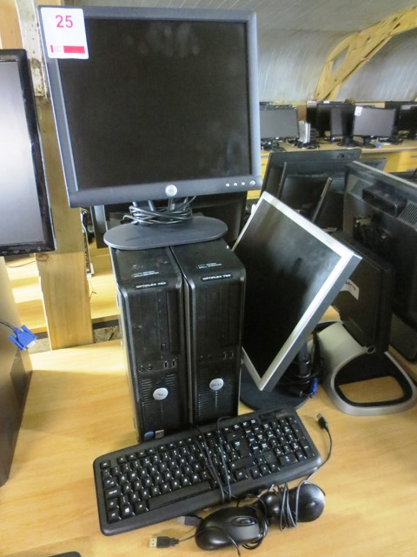 Two Dell Optiplex 760 desktop PCs, serial nos: GWTN84J, 6XTN84J, two flat screen LCD Monitors,