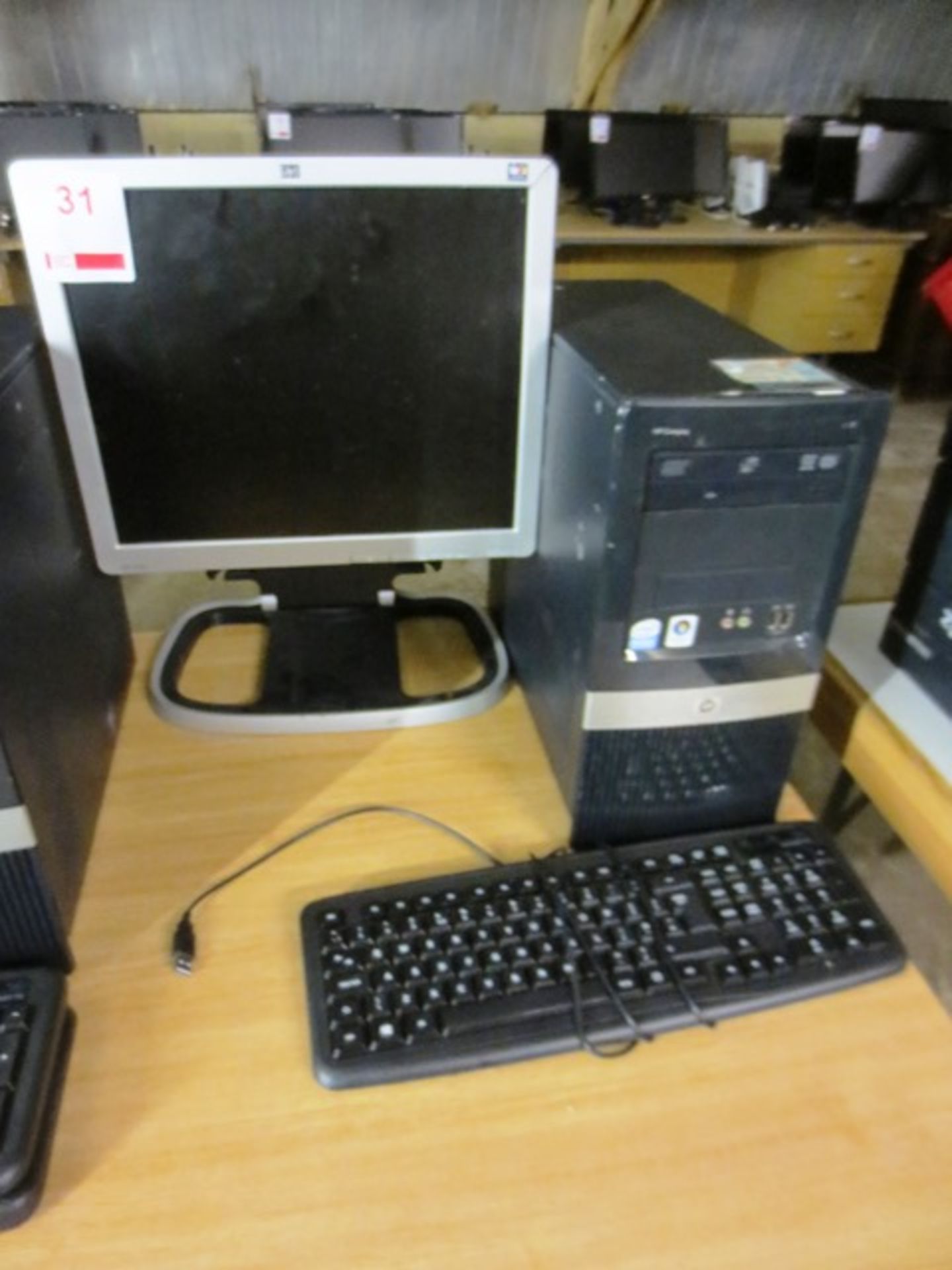 Two HP Compaq DX2400 micro towers, serial nos: 2UA84502Q2, two flat screen monitors, keyboards,