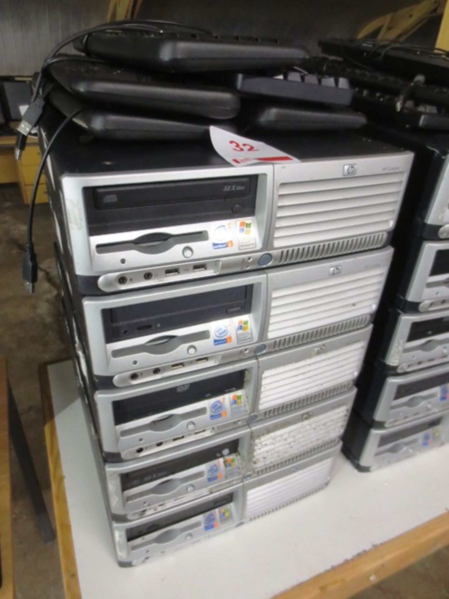 Five HP Compaq desktop PC units, with Intel Pentium 4 processors, five keyboards