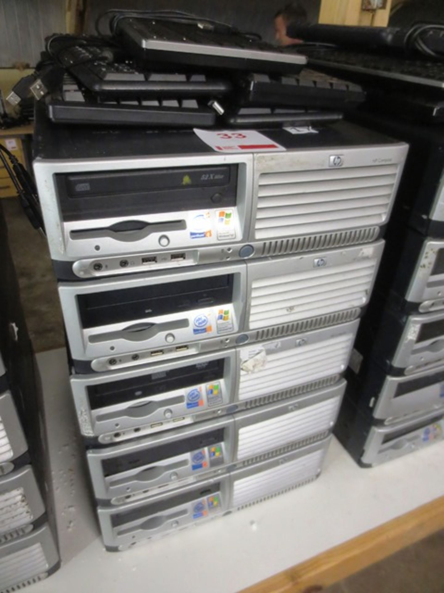 Five HP Compaq desktop PC units, with Intel Pentium 4 processors, five keyboards