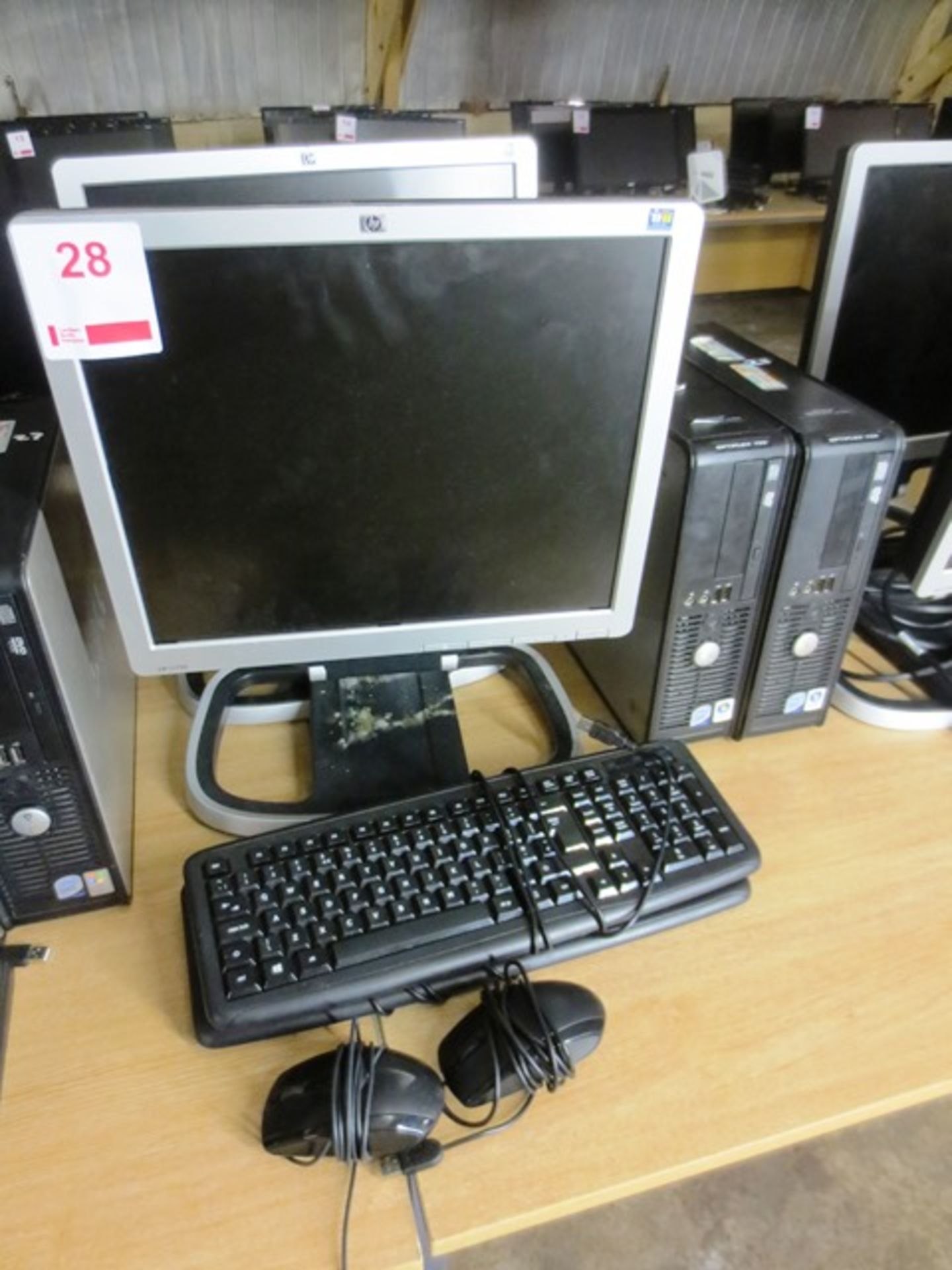 Two Dell Optiplex 755 desktop PCs, serial nos: HVKY04J and 7CP673J, two HP flat screen monitors,