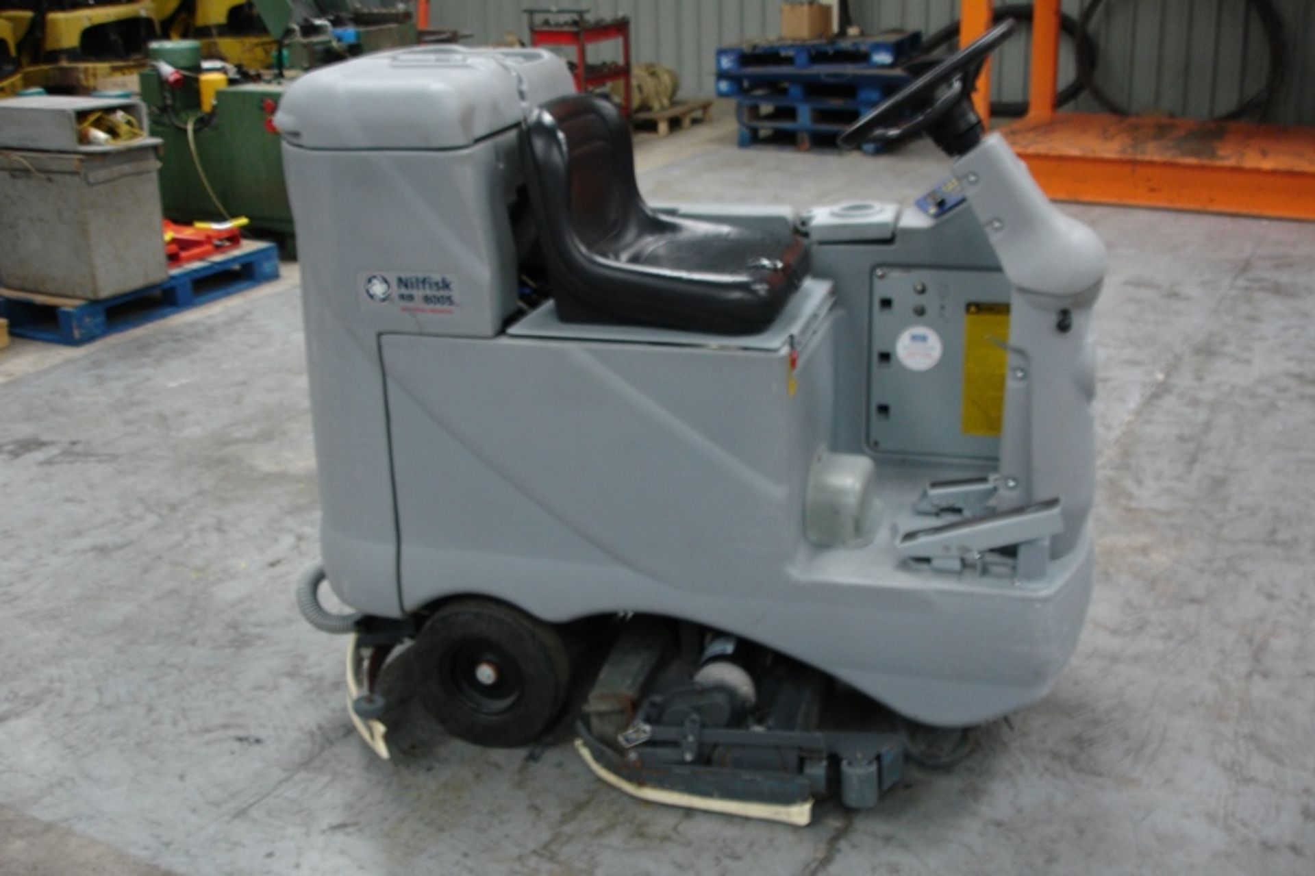 Nilfisk-Advance ride on floor scrubber / drier