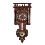 Wanduhr Belgien, um 1900. Holzgehäuse mit reich geschnitzter Front. Hölzernes Zifferblatt von