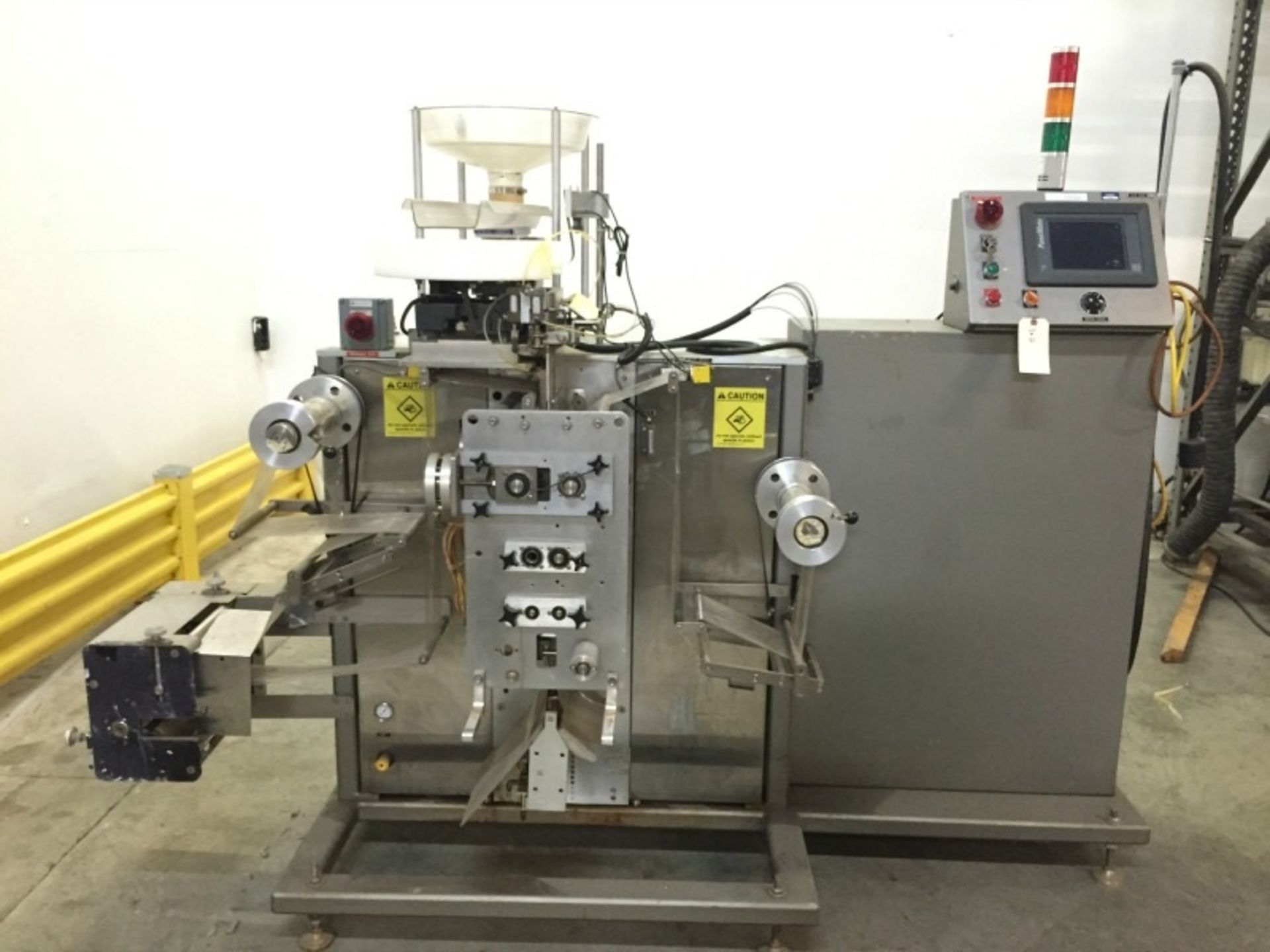 Wrapade Compact Vertical Strip Packer