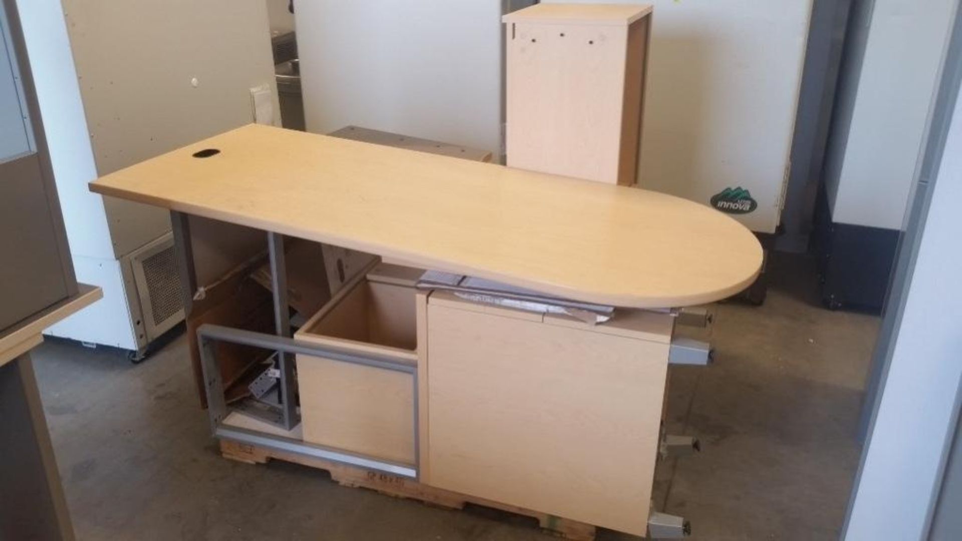 Allsteel L-shape desk with overhead cabinets and (3) drawers. The unit is disassembled.