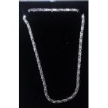 A modern white gold flat curb link chain necklace, stamped 375