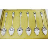 Liberty & Co. cased set of six silver and enamel teaspoons, the terminals with trefoil petals and
