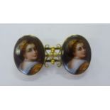 A 15ct gold bar brooch mounted with two oval porcelain plaques painted with a female looking over