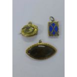 Two 19th century hair plaid mourning brooches, each set in yellow metal frames together with a