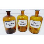 A set of three amber glass chemist bottles/jars, labelled for Tinct Valerian, Spir Formicar, and