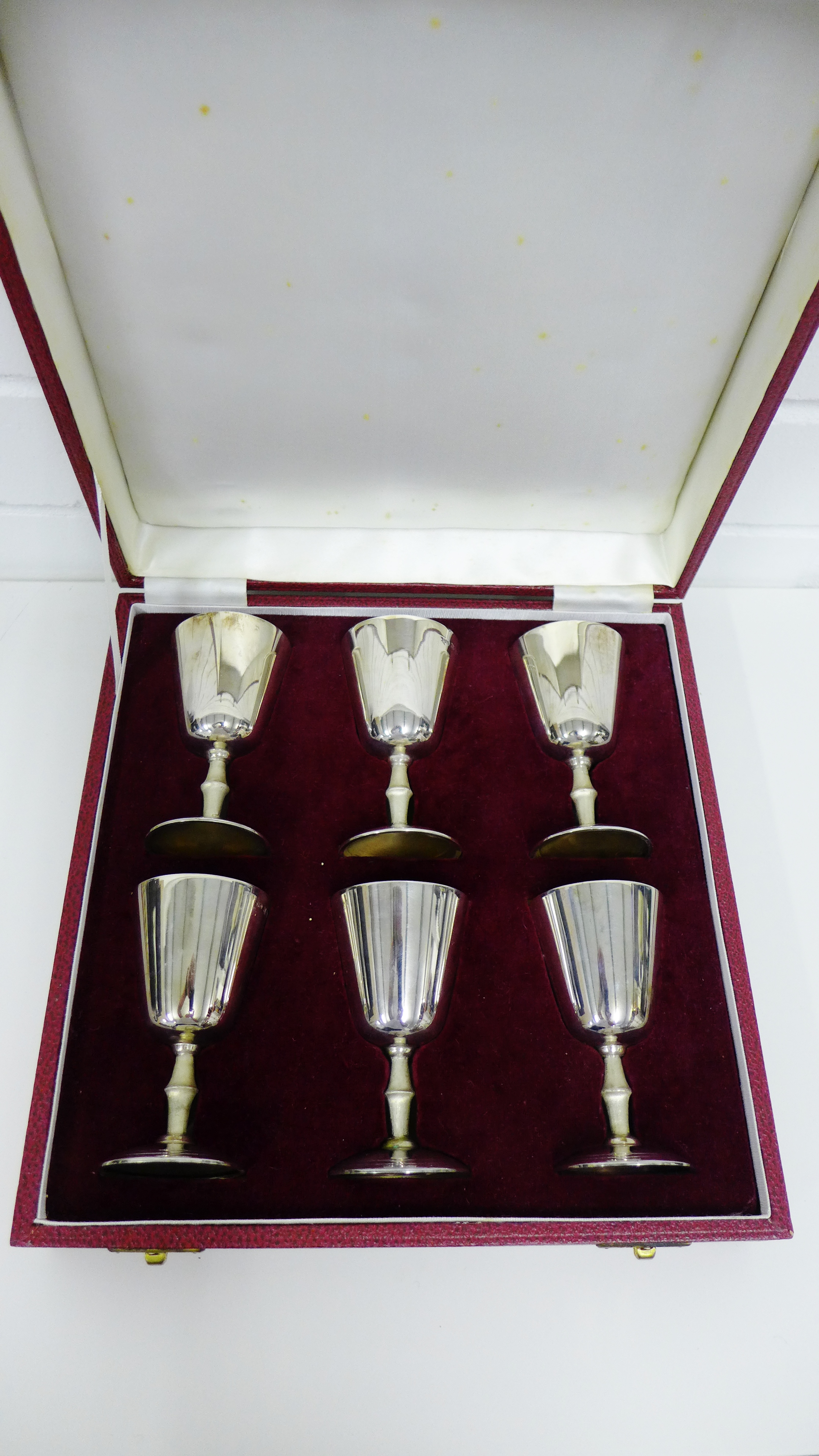 Six silver gilt goblets with maker's mark for Deakin & Francis Ltd, Birmingham 1972, in original