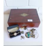 A stained wood jewellery box containing a vintage gold plated wristwatch, two silver bangles, an