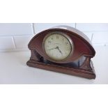 An Edwardian mahogany and marquetry inlaid mantle clock, the circular white dial by Walker &