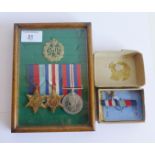 Framed group of three medals to include 1945 Star, France and Germany Star and the Defence Medal