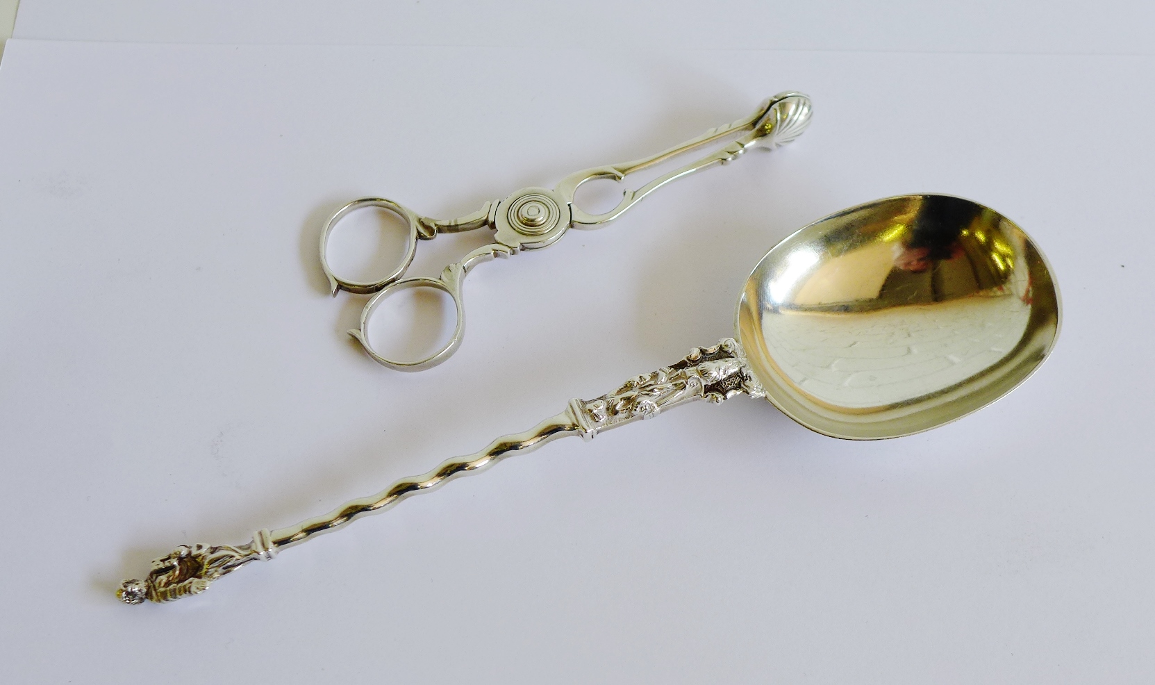 Victorian London silver Apostle Spoon, 19cm long, together with a pair of silver sugar tongs with