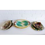A collection of 19th century Scottish majolica to include two Dunmore leaf shaped dishes and three