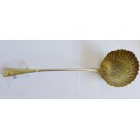 A George V silver soup ladle with shell pattern bowl by the Goldsmith's and Silversmith's Company,